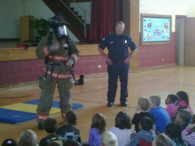 A few Members doing Public Education at a School